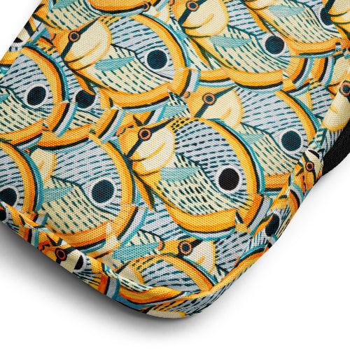 Close-up of a fabric with a colorful fish pattern on a white background